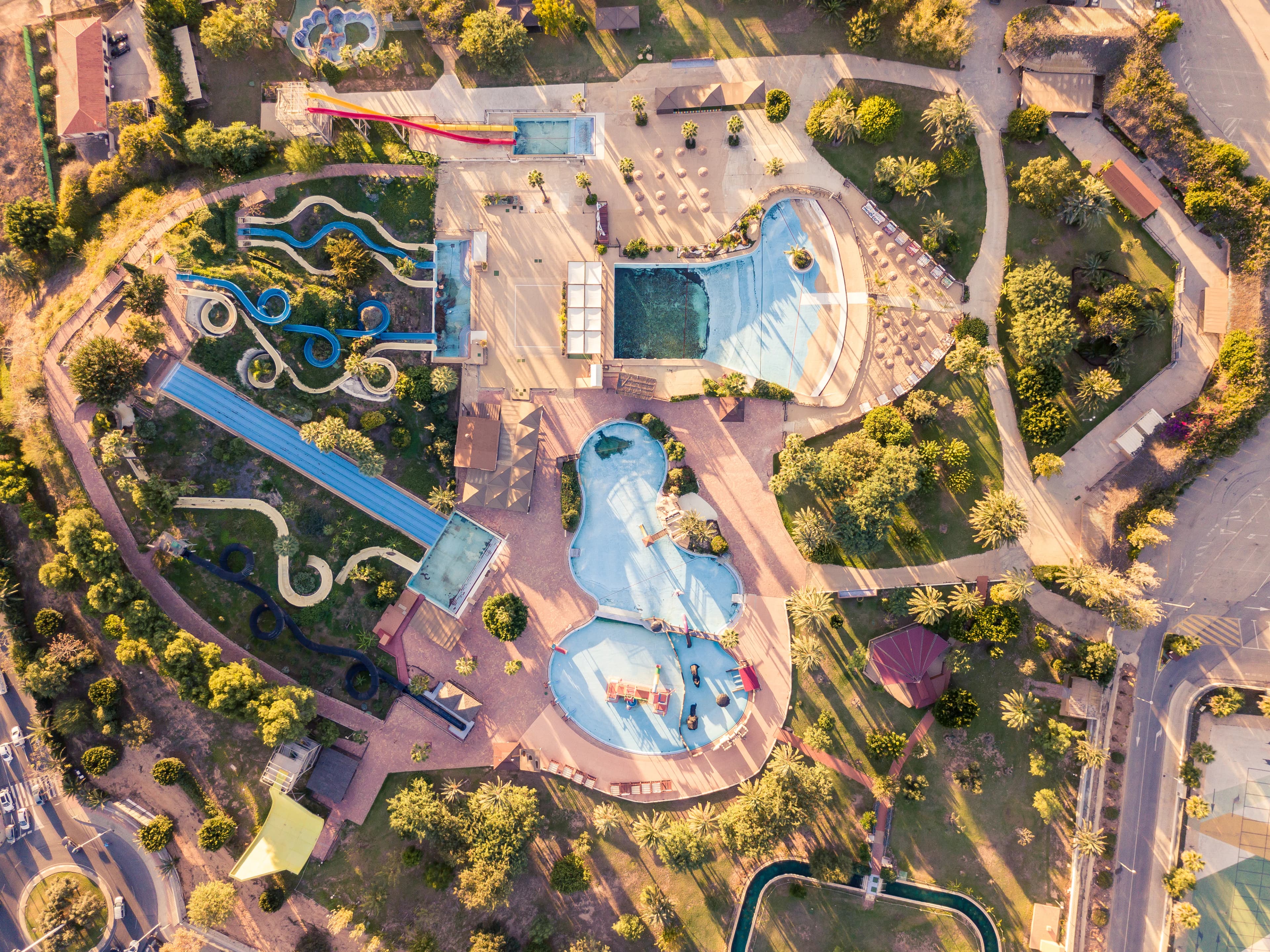 aerial view of park with swimming pools
