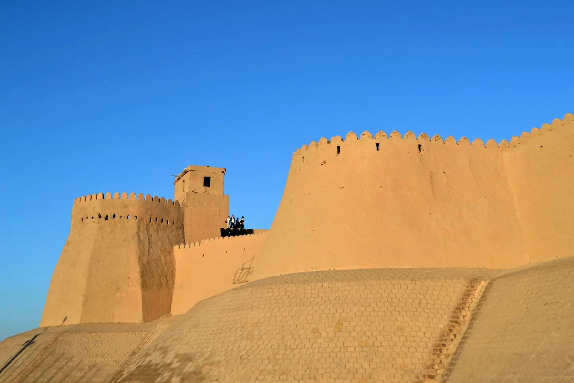 brown concrete building under blue sky during daytime