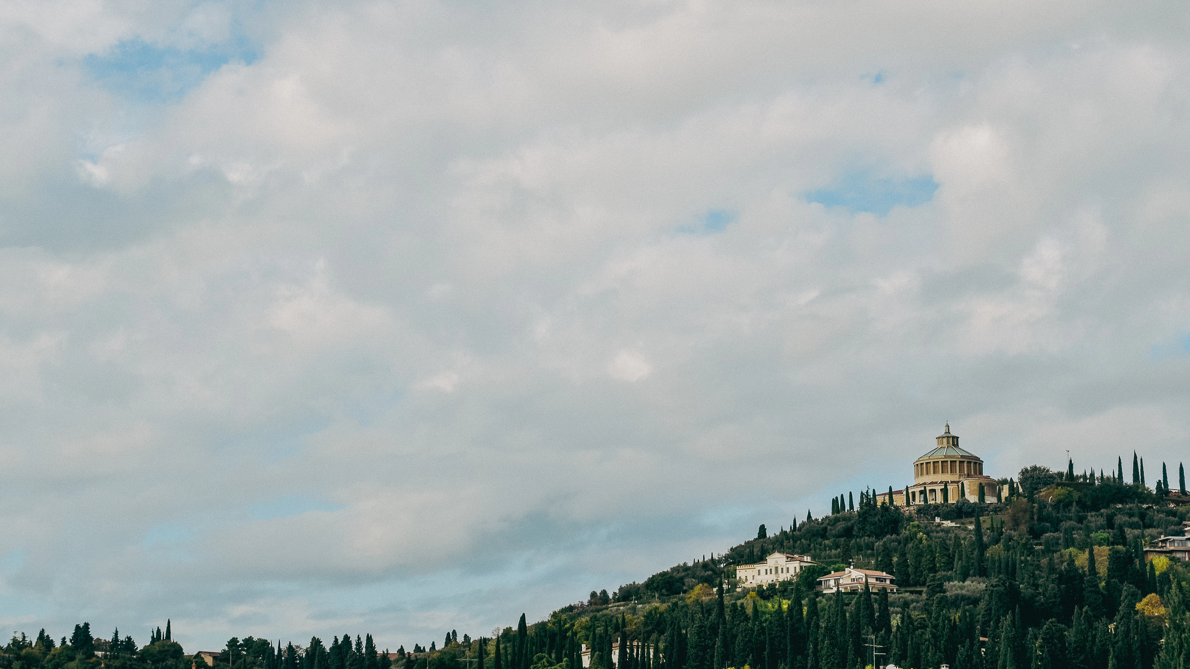 a large building on a hill