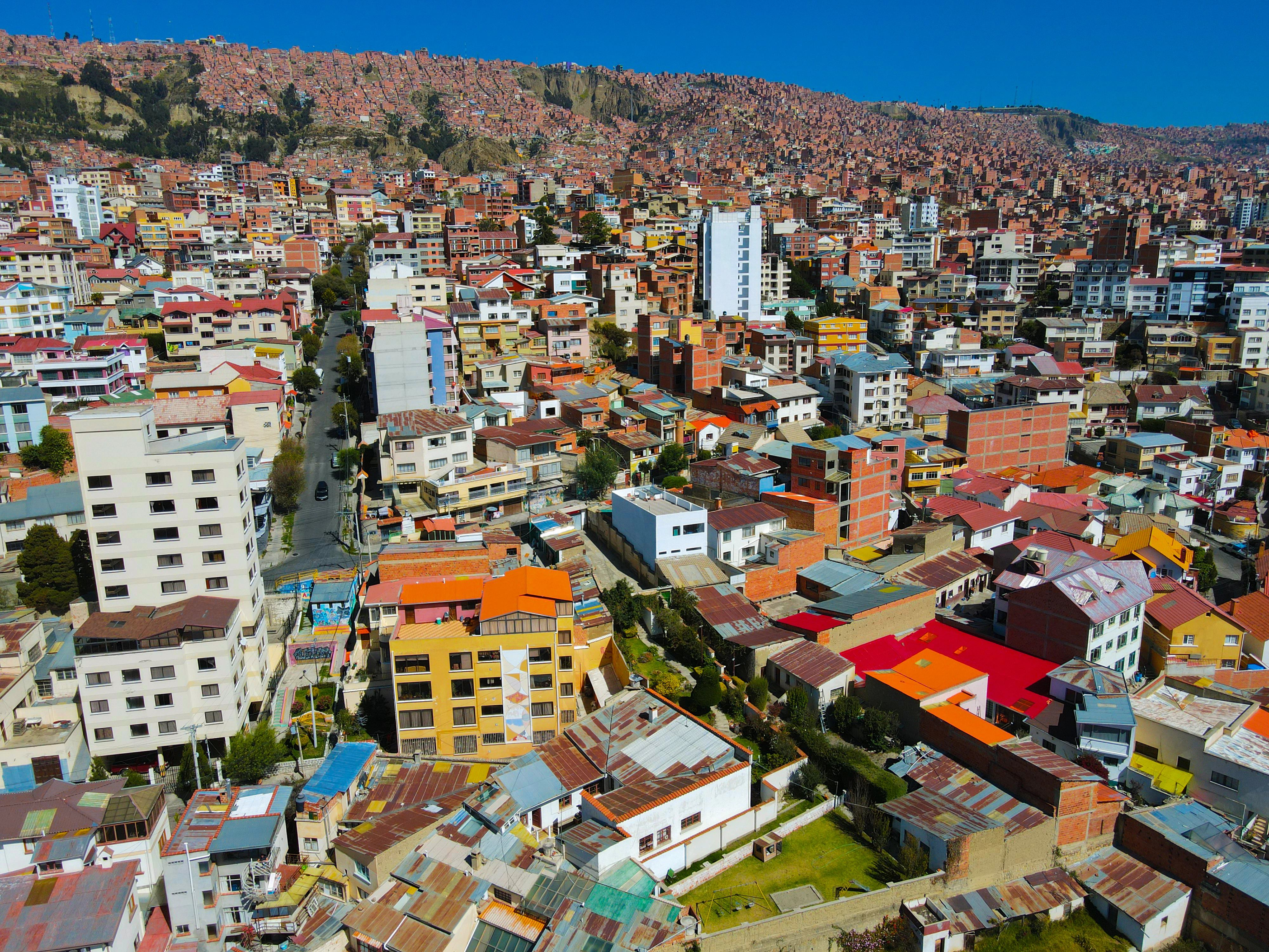 an aerial view of a city with colorful buildings