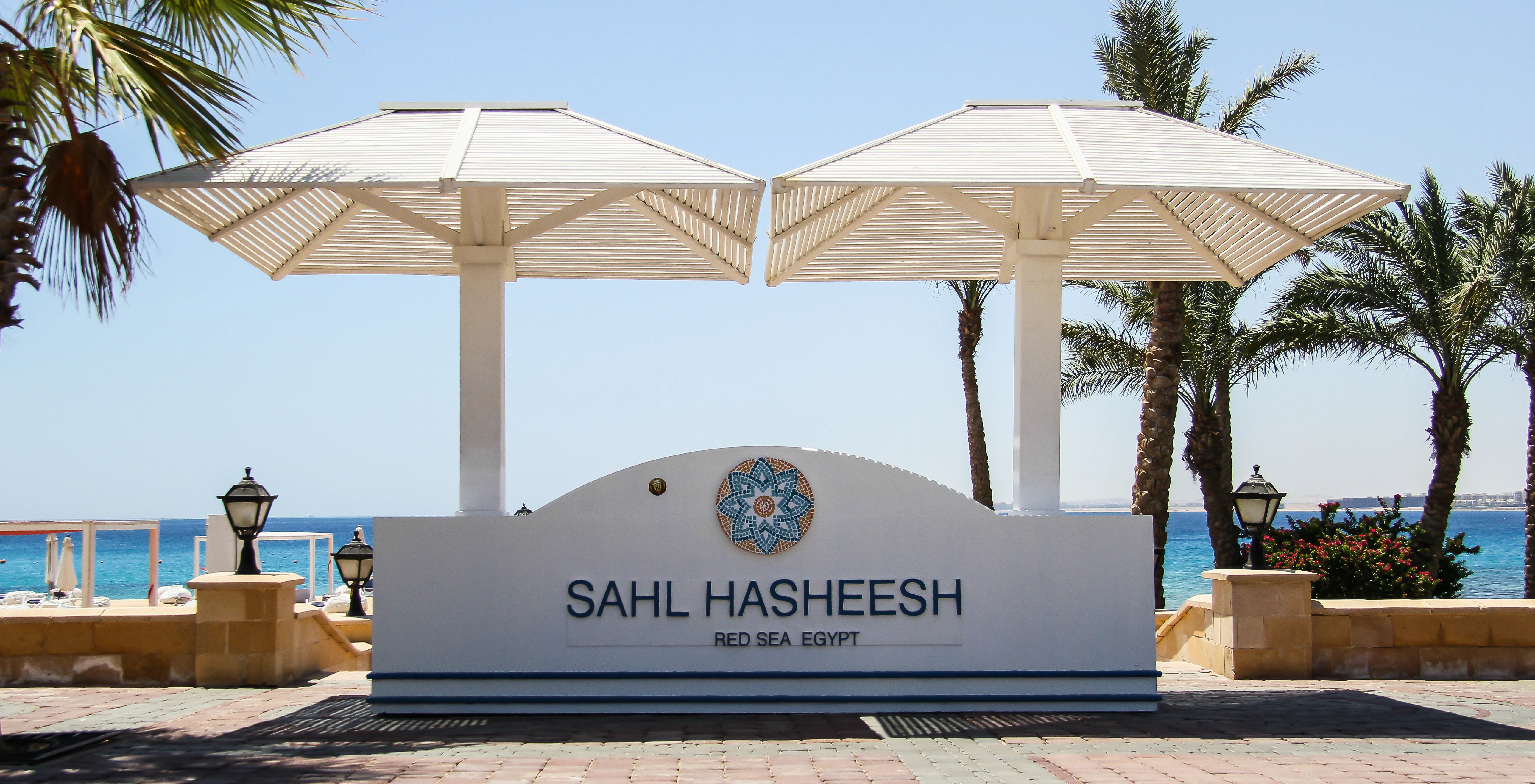 white and blue wooden gazebo