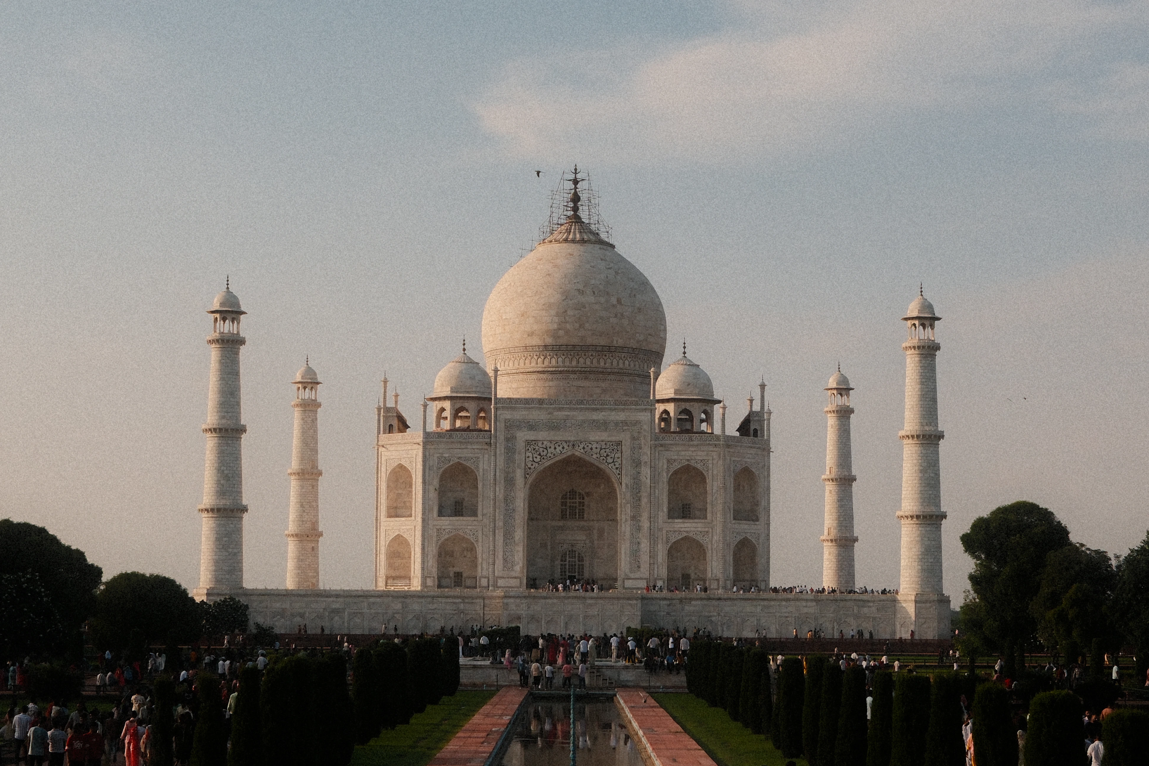 The taj mahal mausoleum in india on a clear day.