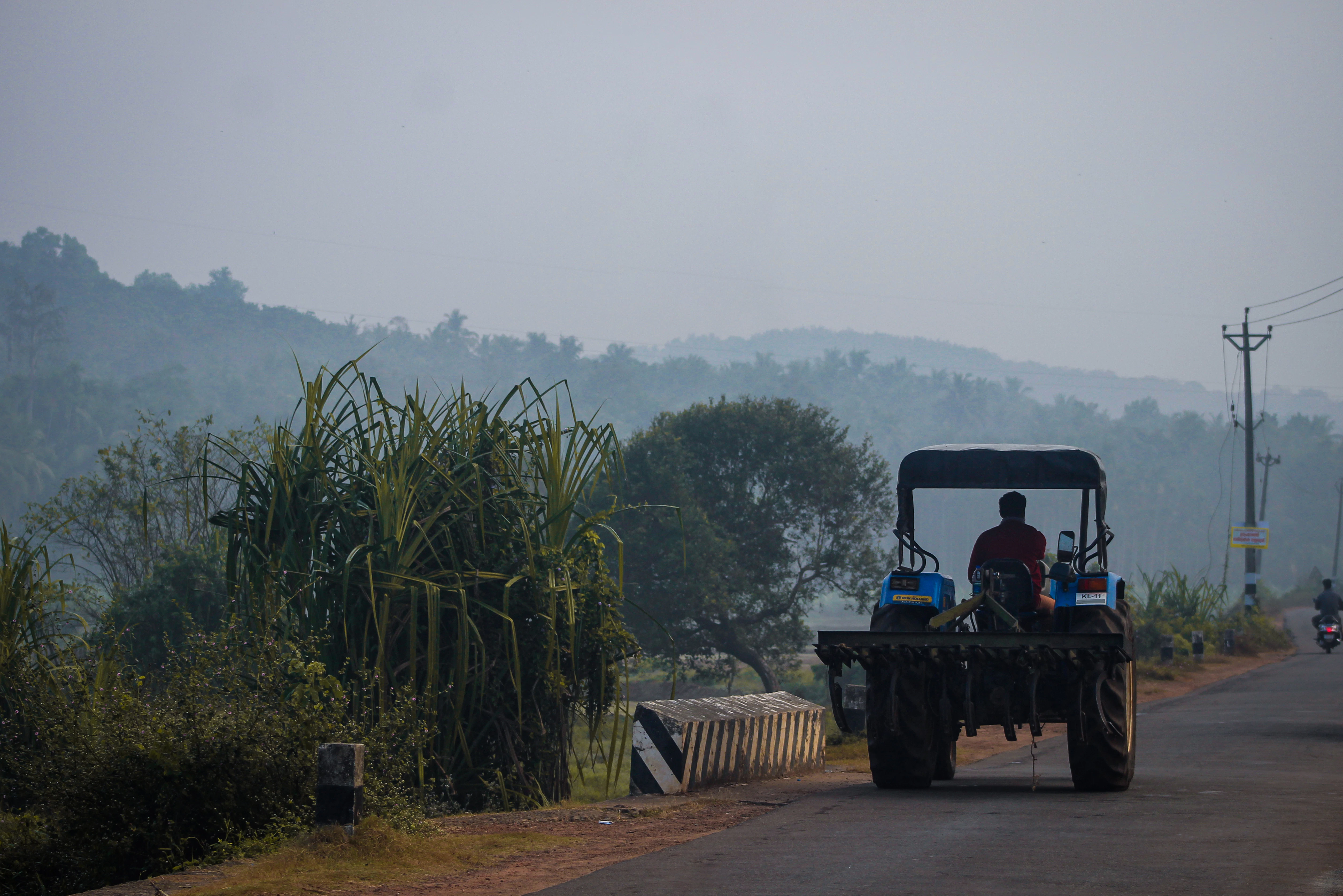 people riding on black and white vehicle during daytime