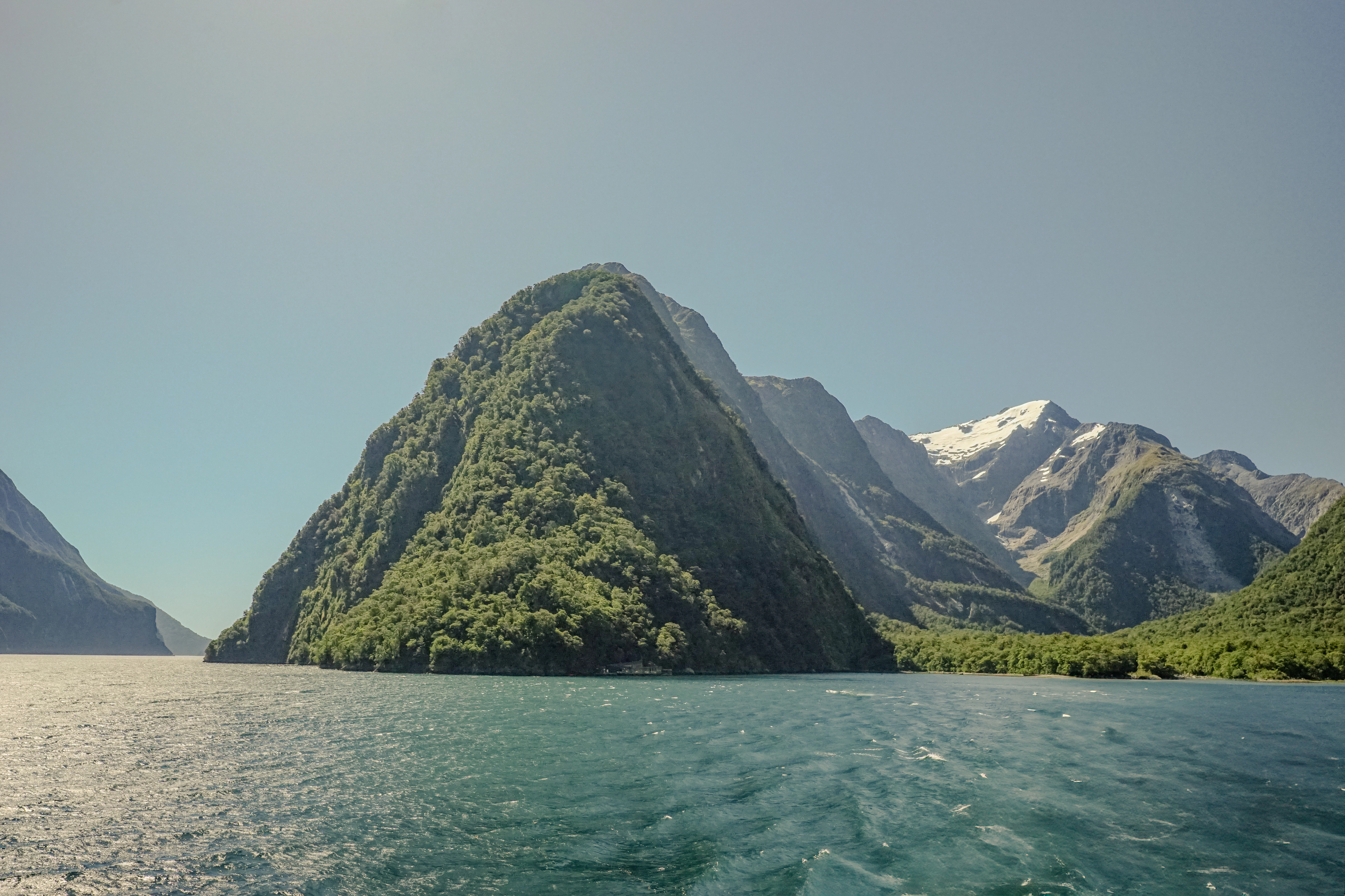 A view of a mountain range from a boat