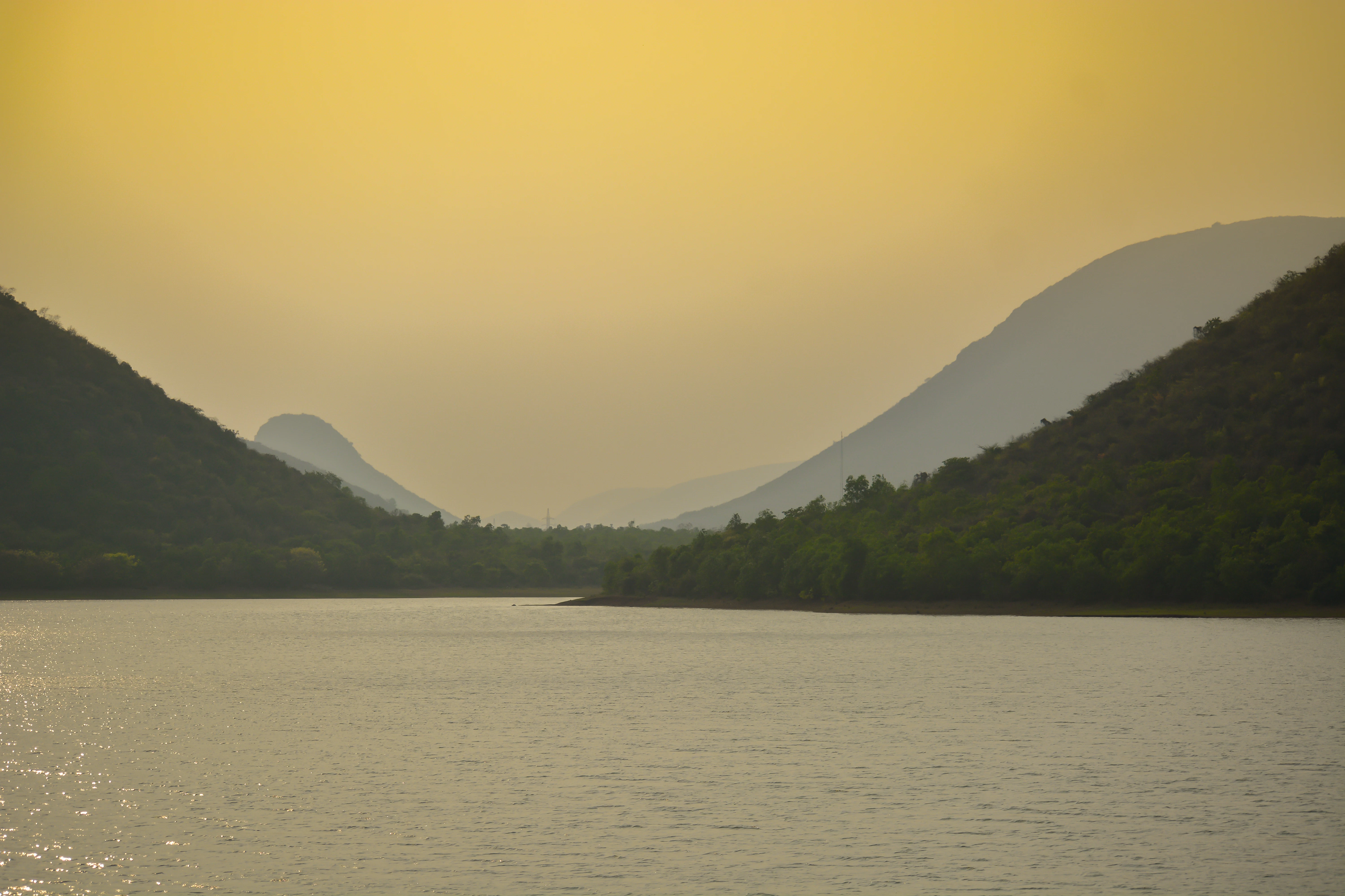 a large body of water surrounded by mountains