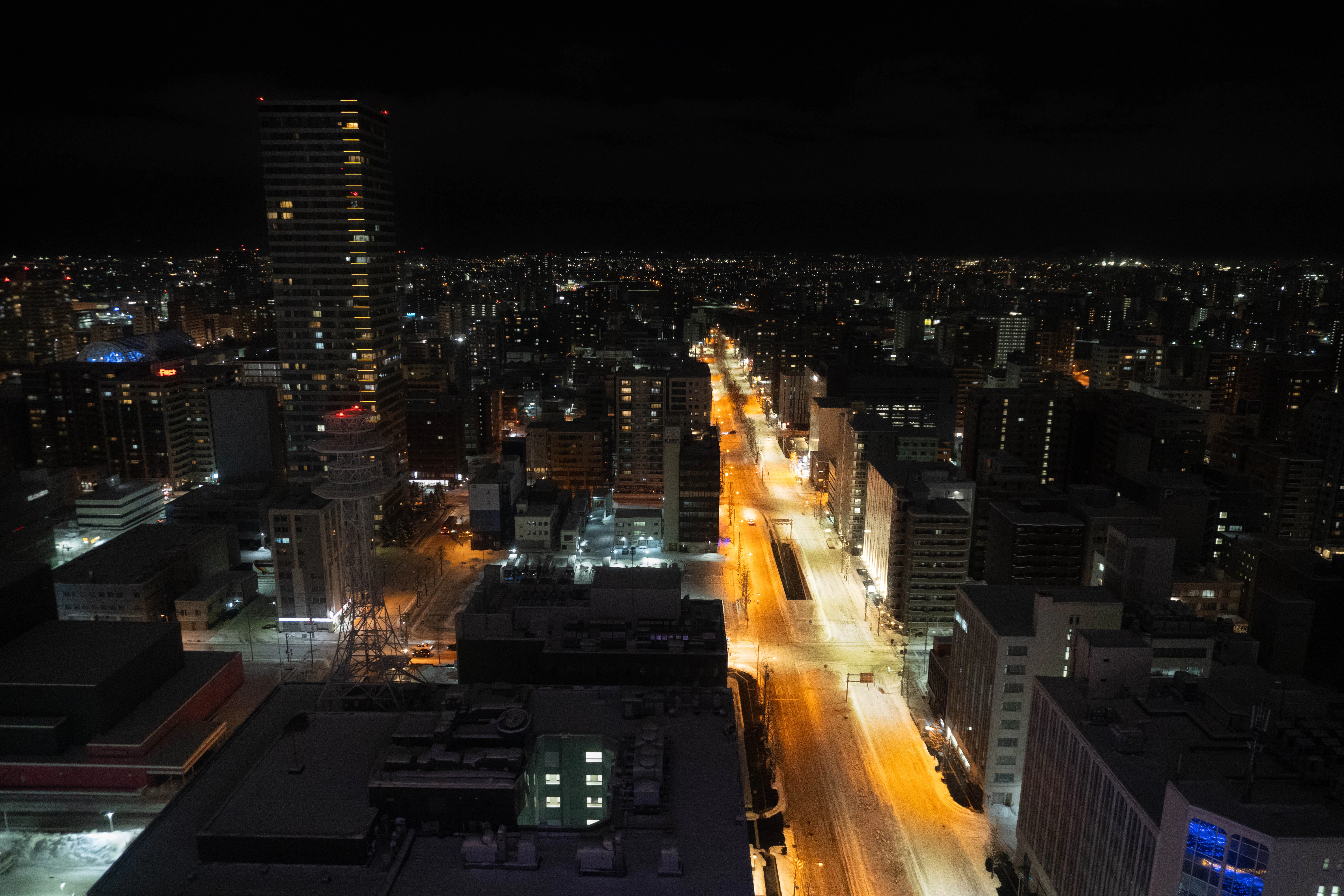 City lights shine brightly at night.