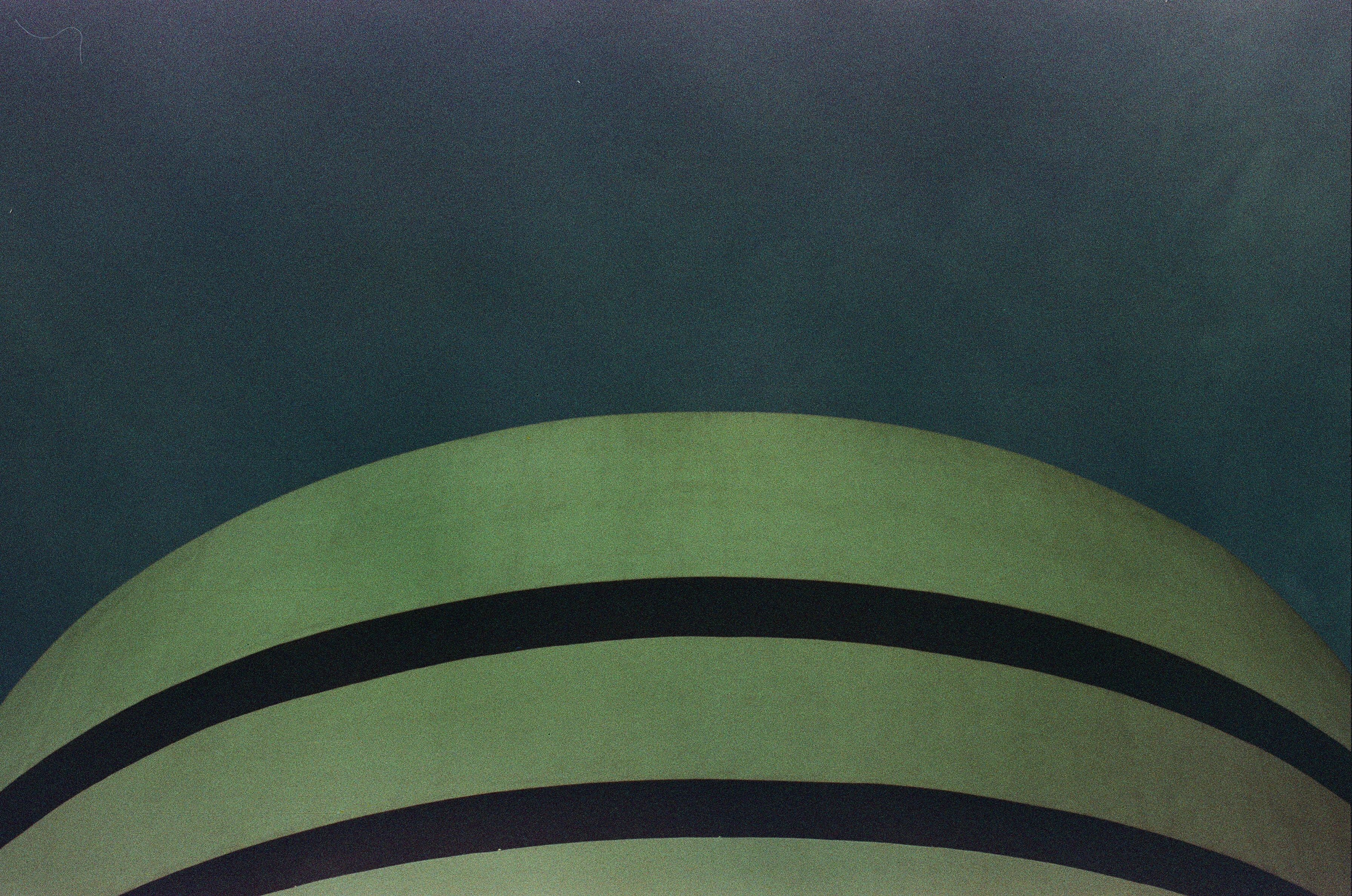 green and black striped textile