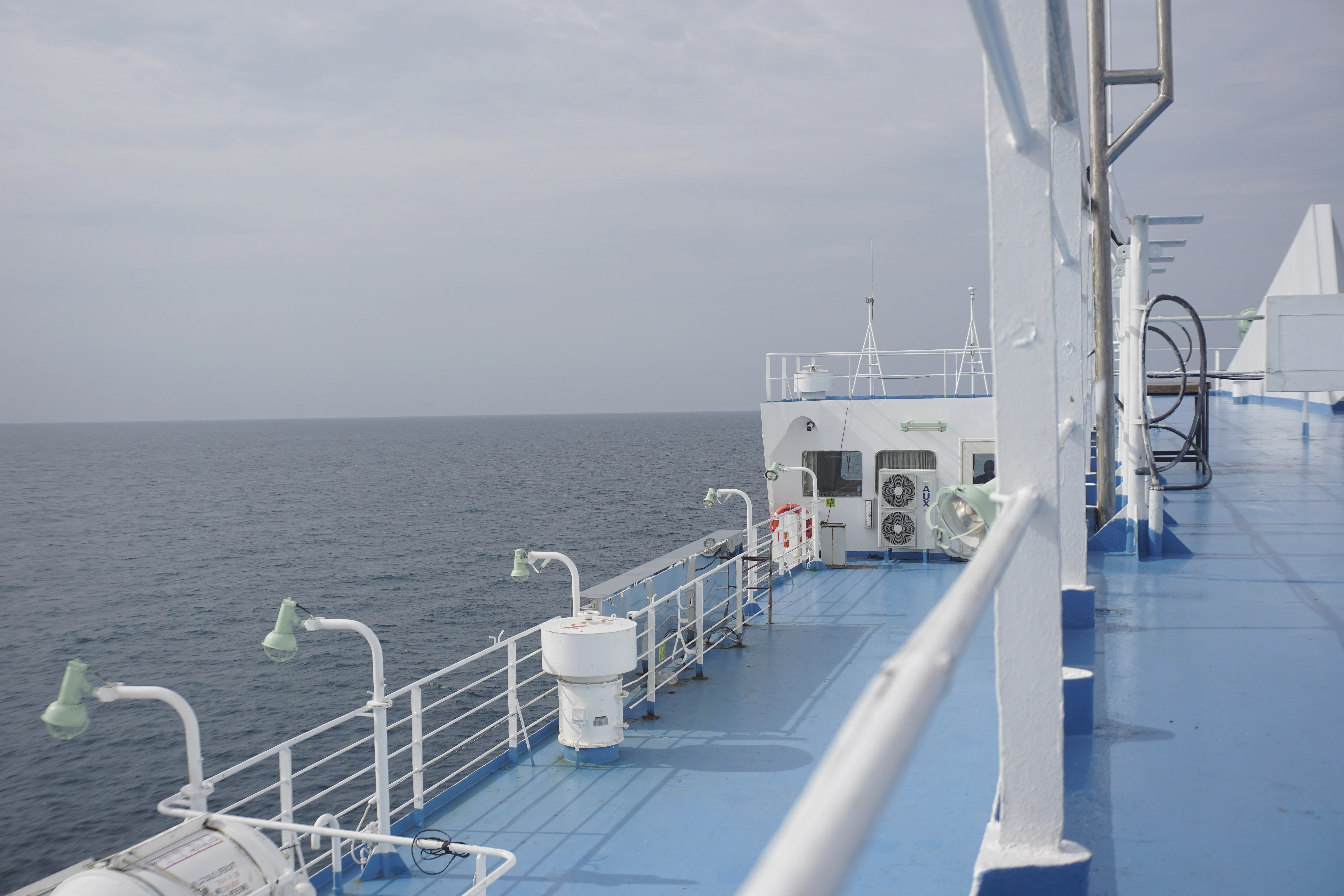 Deck of a ship sailing on a calm sea