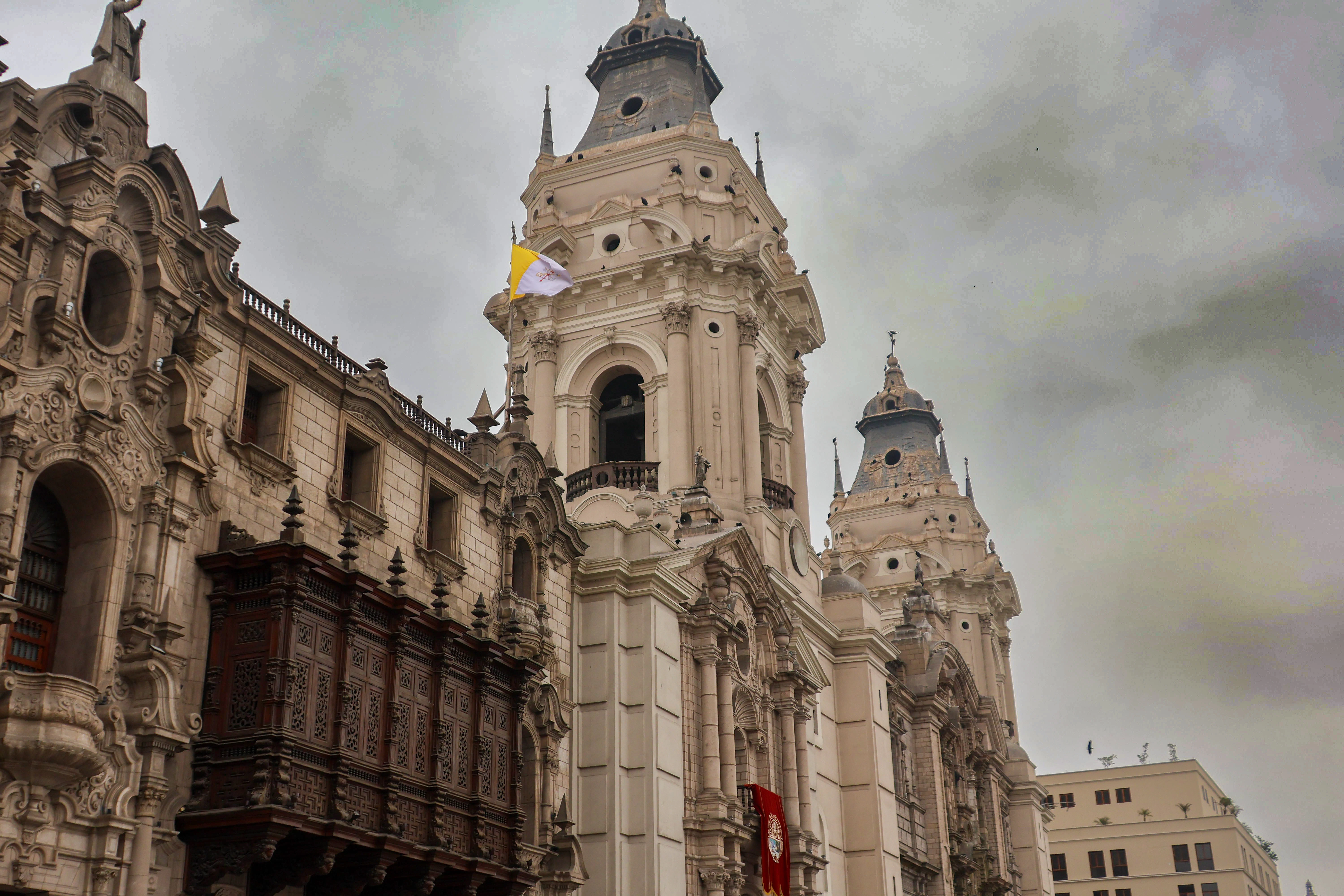 A large building with a clock on the top of it