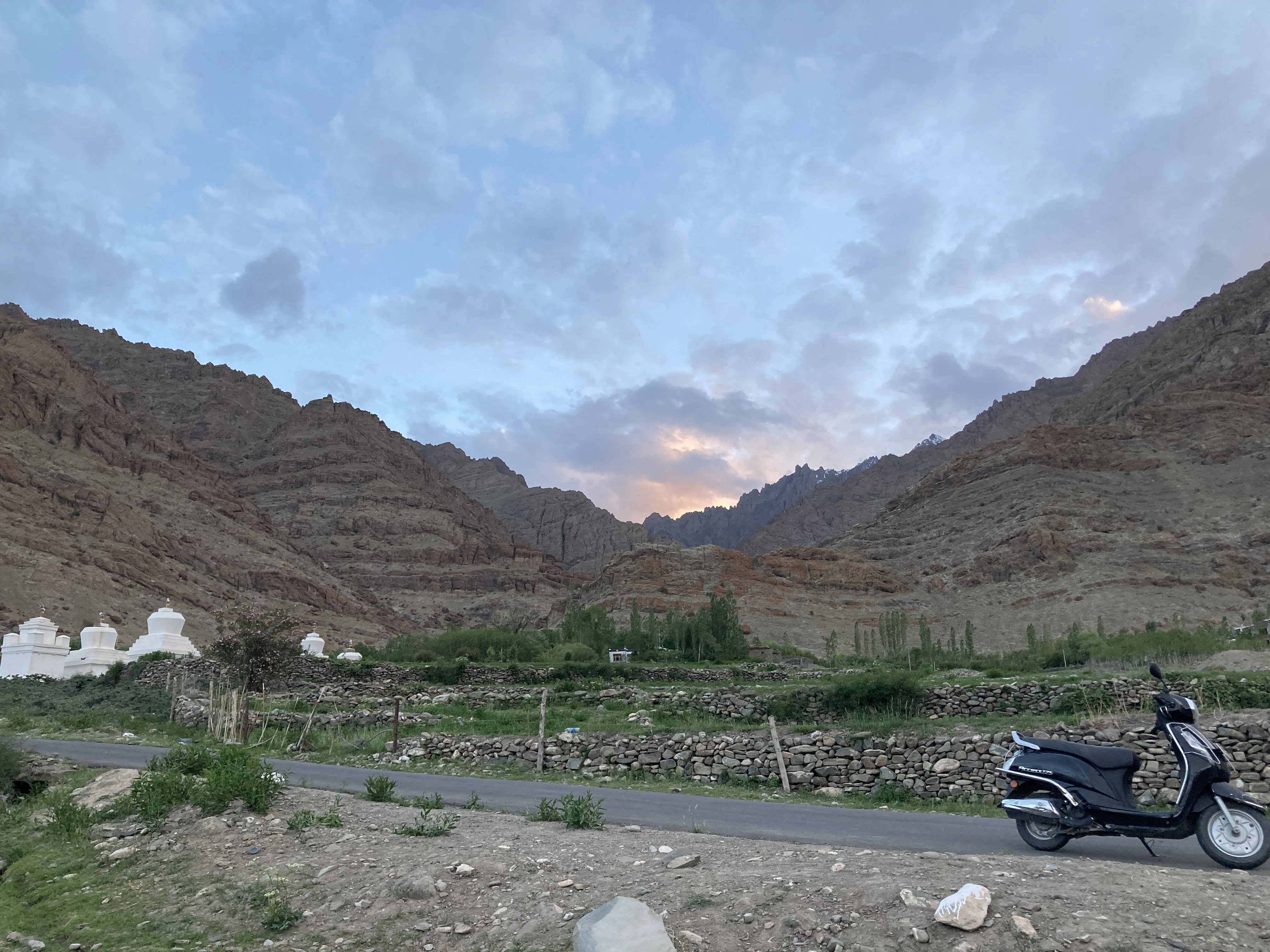 a motorcycle parked on the side of a road